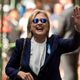 Hillary Clinton waves after leaving an apartment building Sunday, Sept. 11, 2016, in New York. (Image: Associated Press)